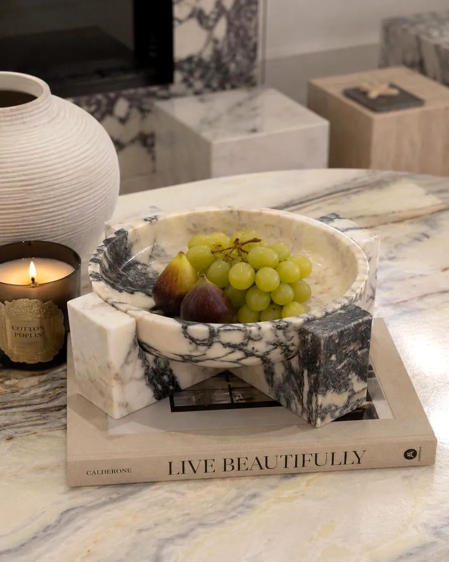 Sculptural marble fruit bowl on a cross-block stand